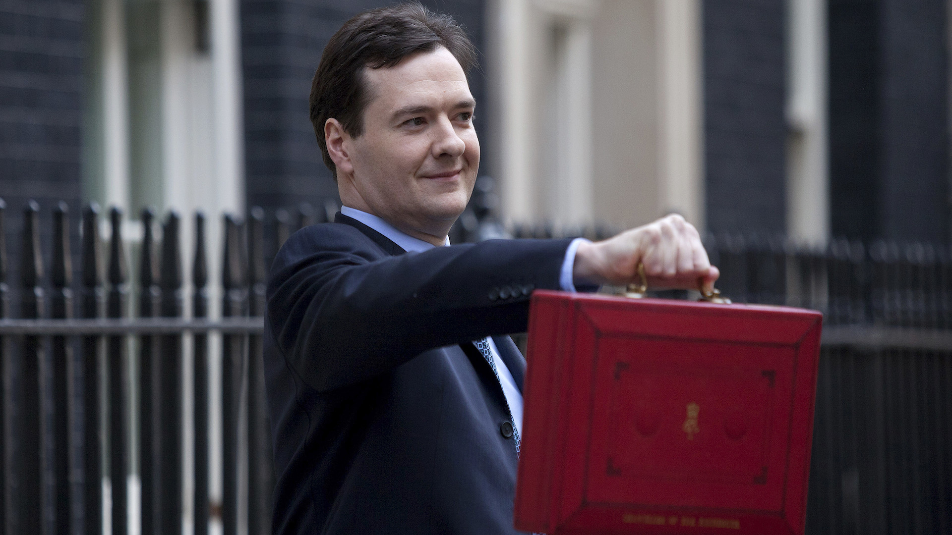 George Osborne holds the red budget box outside downing street