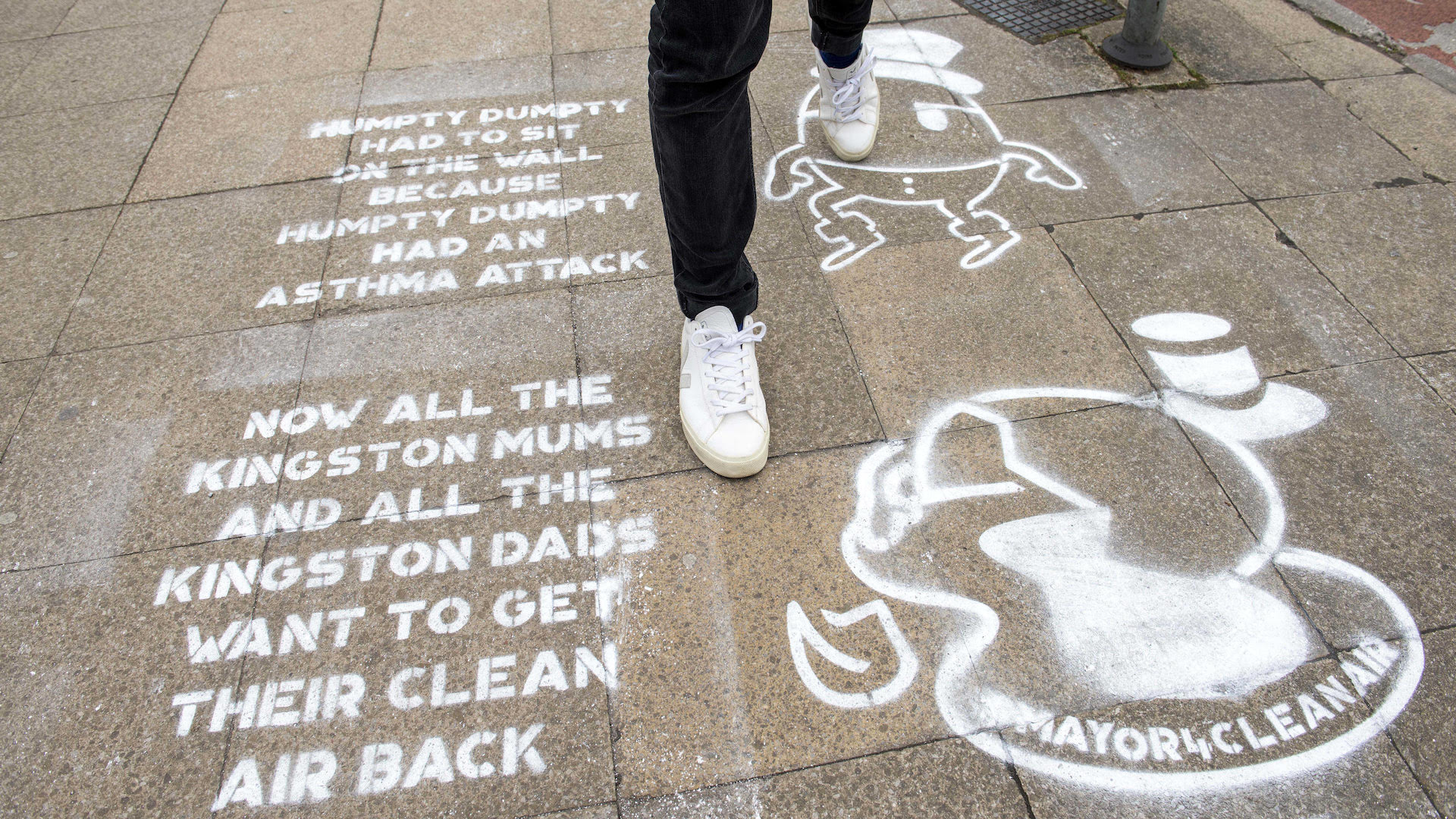 The Mums for Longs air pollution graffiti stencil outside Kingston rail station