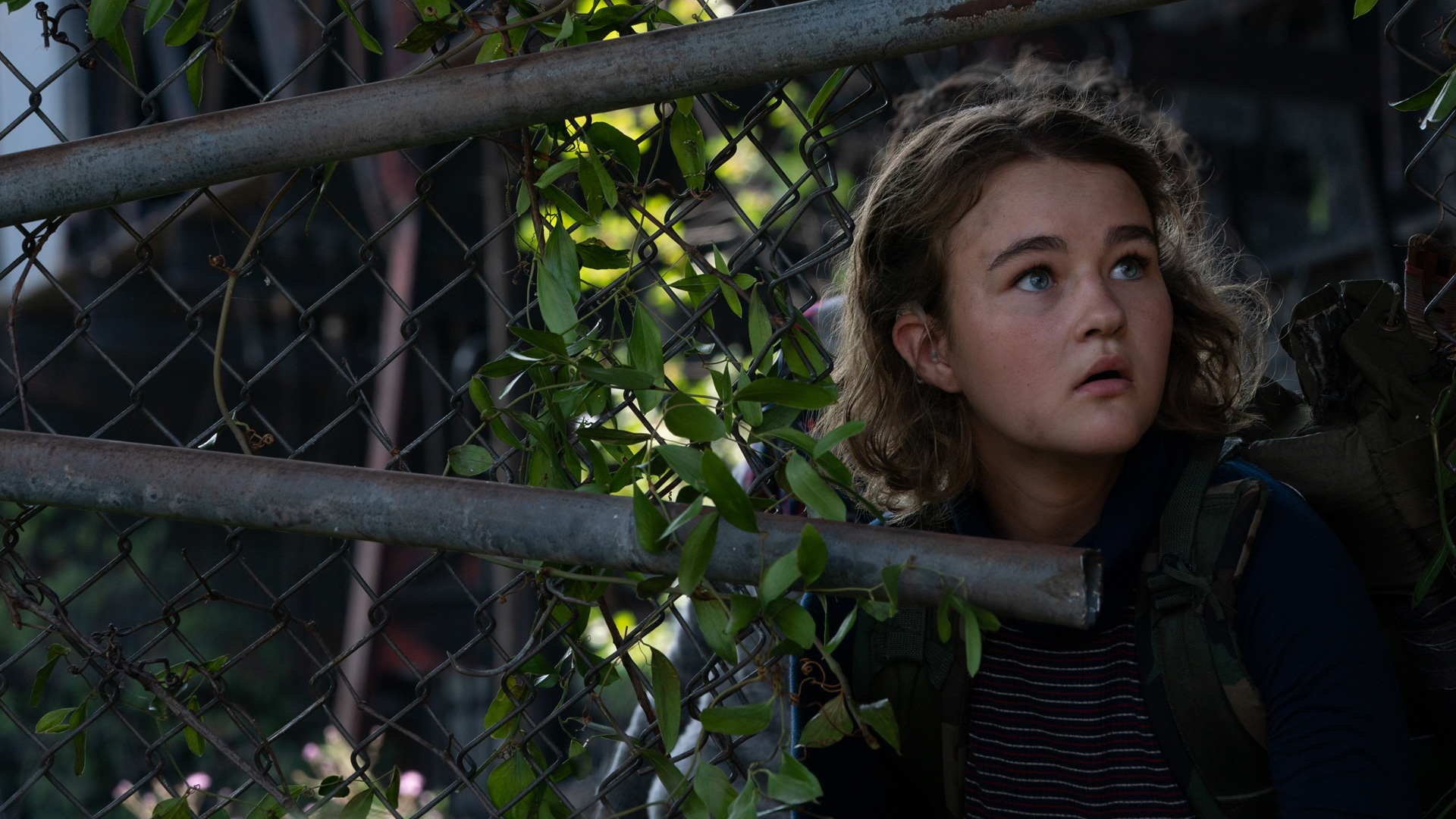 Millicent Simmonds hides from the monsters in A Quiet Place Part II