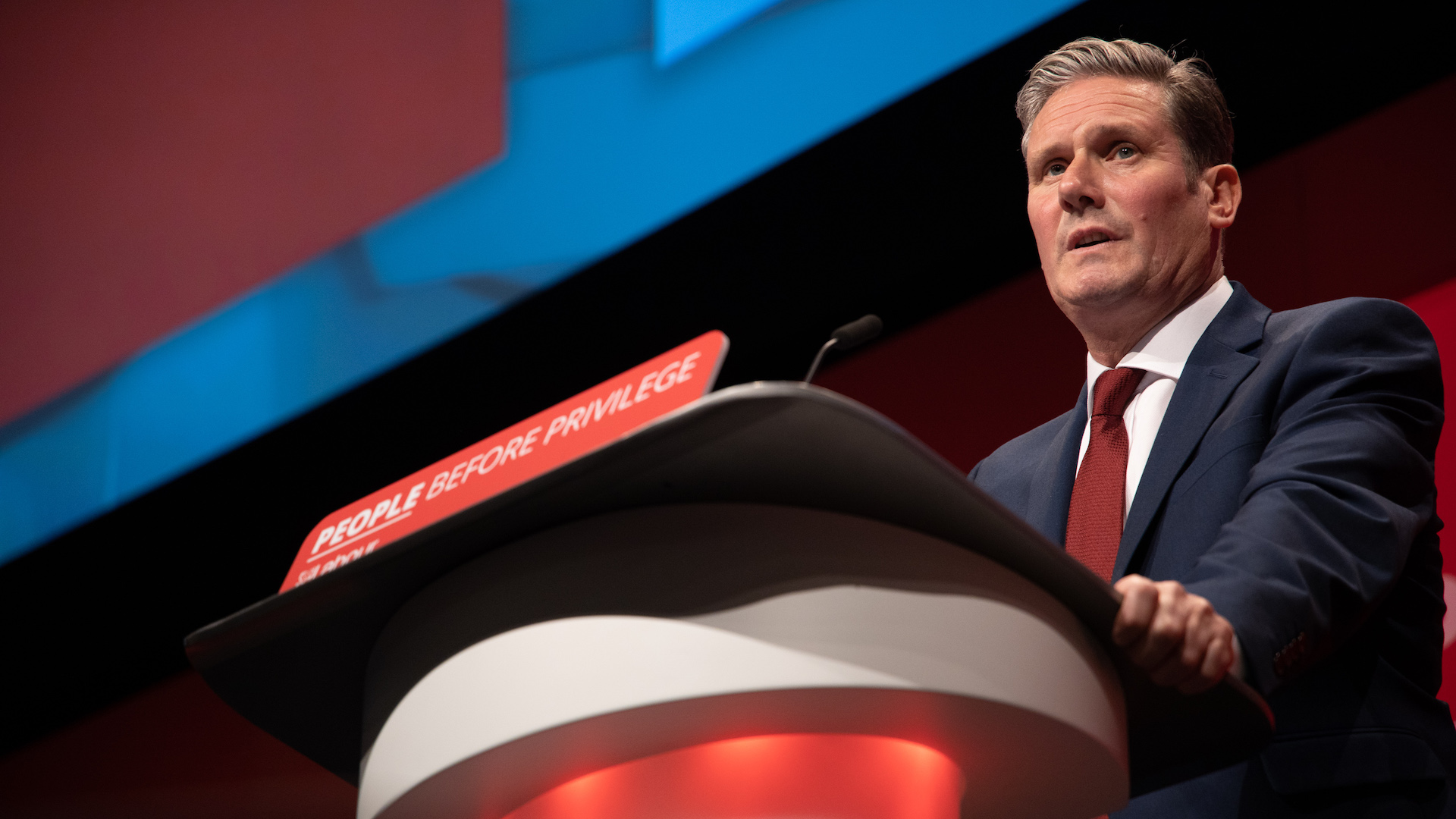 Labour leader Keir Starmer stnads at a lectern at Labour conference in 2019