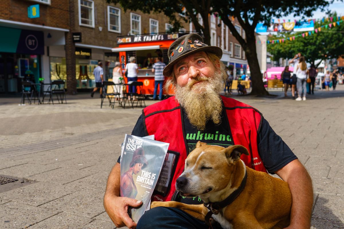 Darren Roberts sells The Big Issue in Canterbury high Street. Photo: Exposure Photo Agency