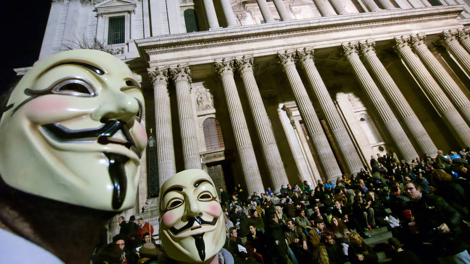 Protesters wearing masks at the Occupy London protest outside St Paul s Cathedral in London Photo: David Pearson / Alamy Stock Photo