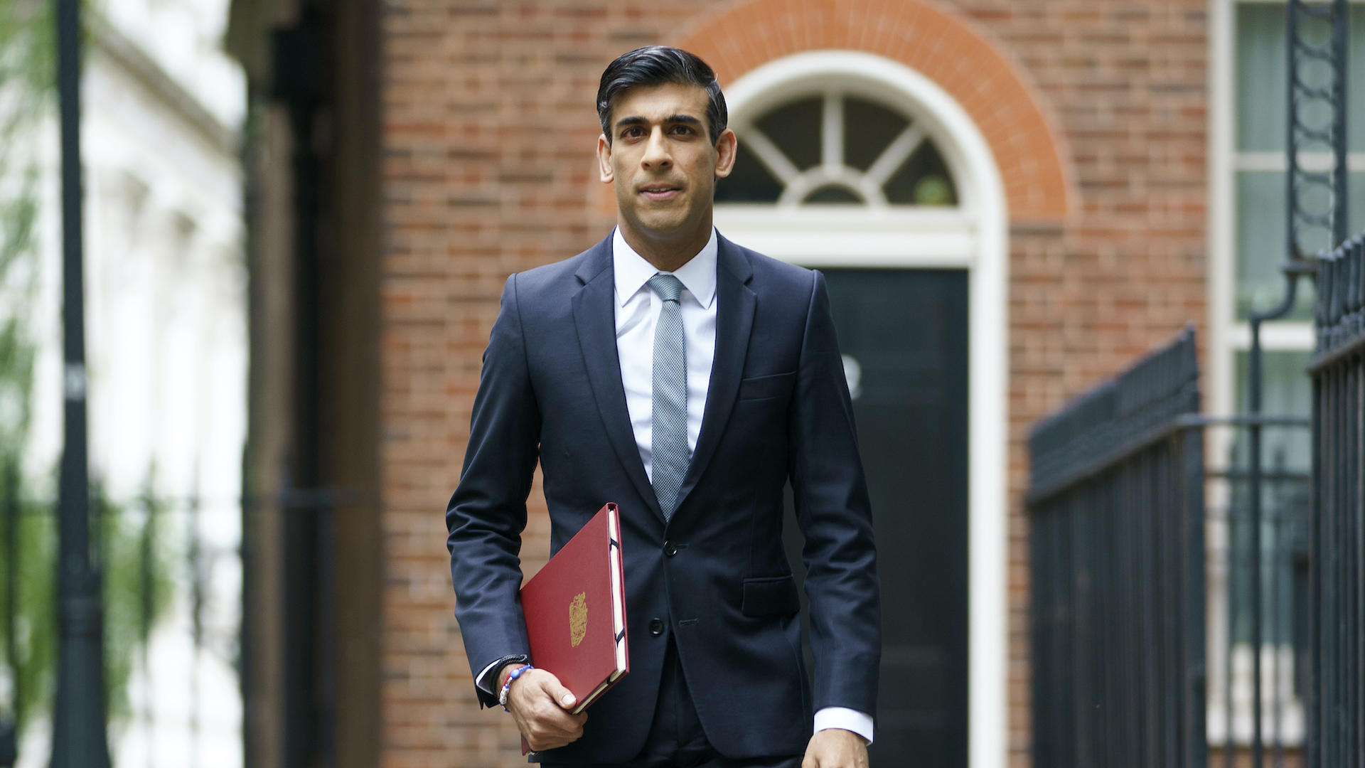 Rishi Sunak leaving No 10 Downing Street. Charities said he is doing too little for refugees