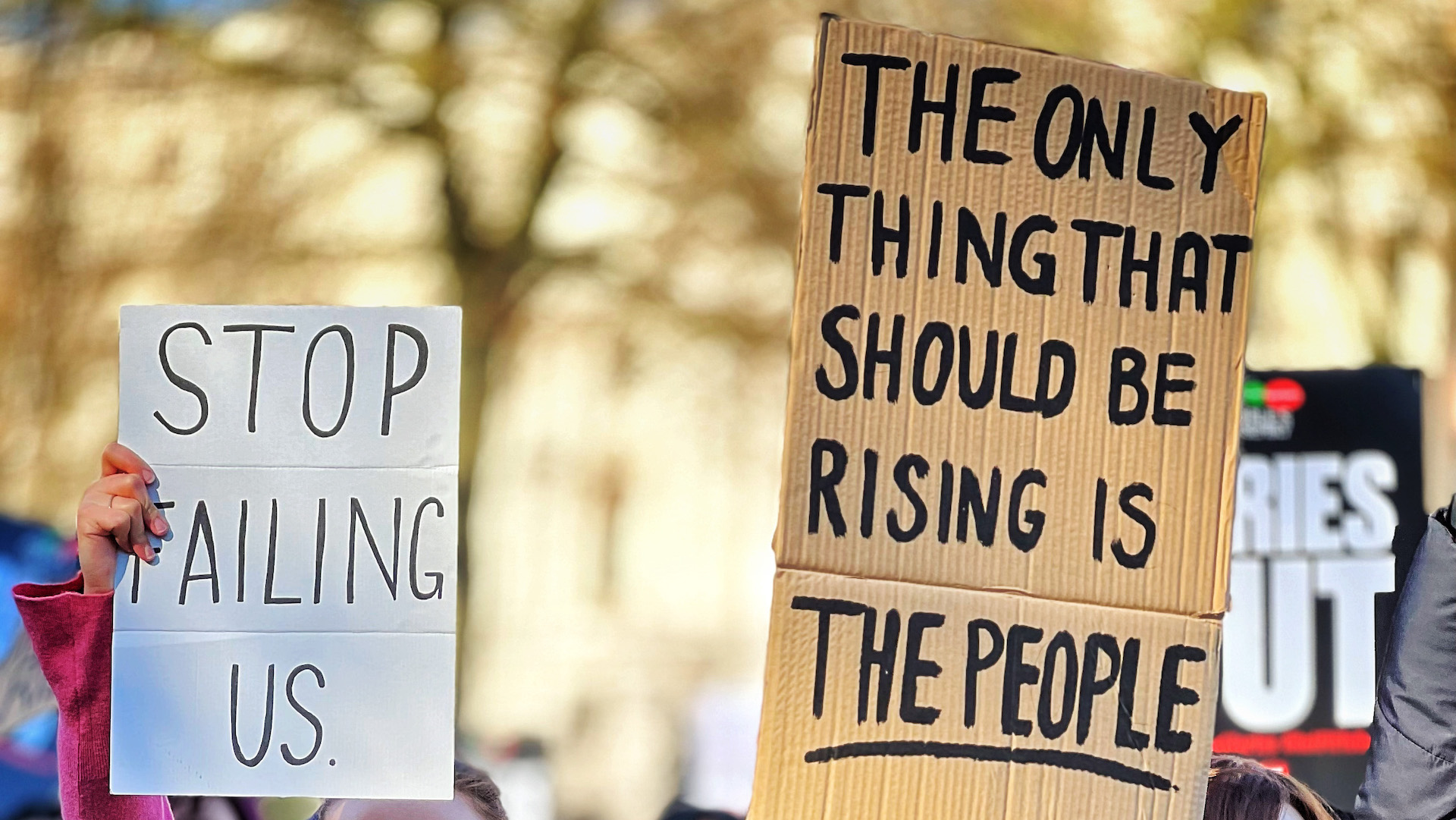 Placards at the cost of living protest in London 2022. Image: arry Knight/Flickr.