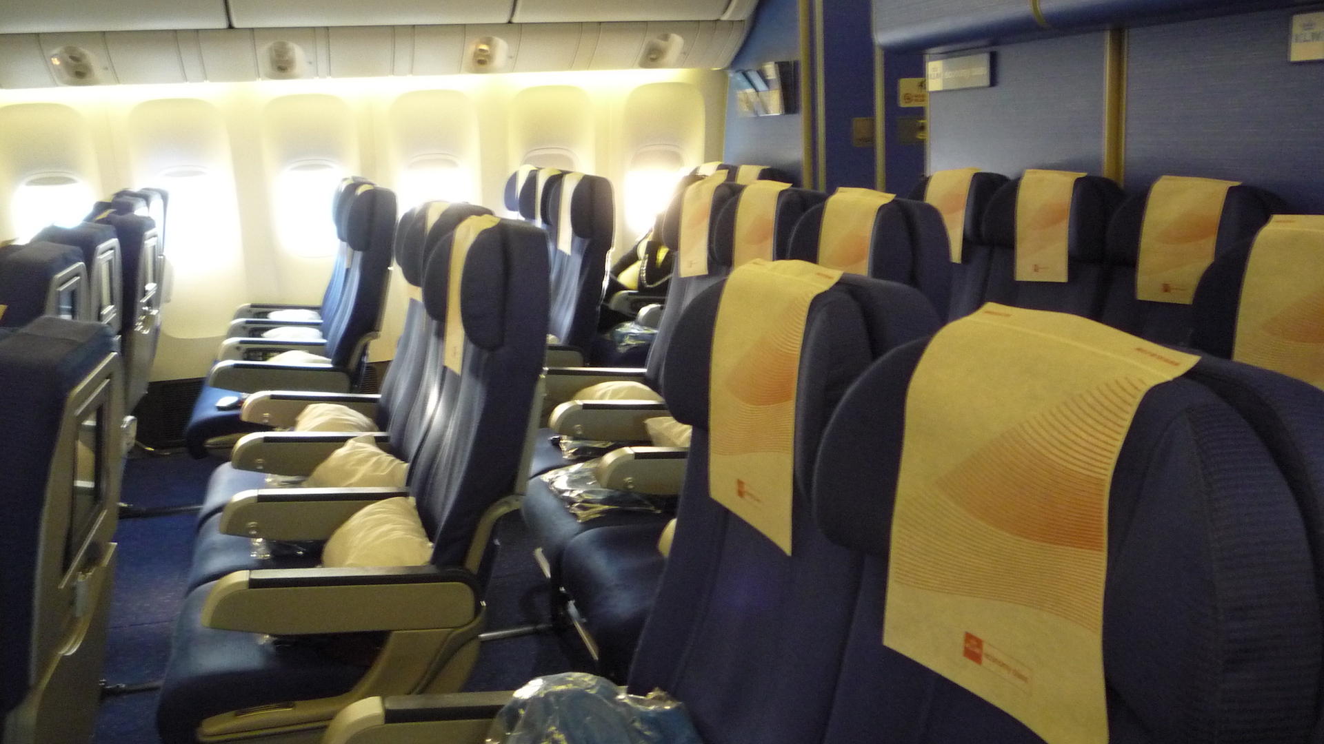 Rows of empty seats on a plane
