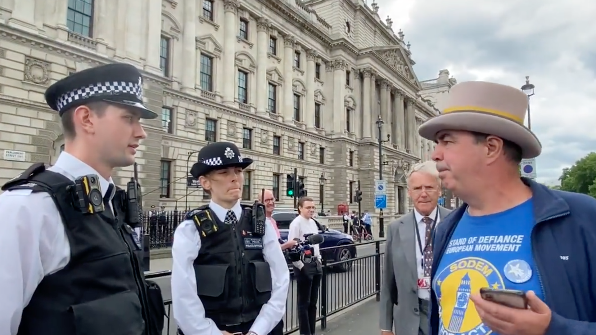 Police speak to Steve Bray before seizing his amplifiers outside Parliament