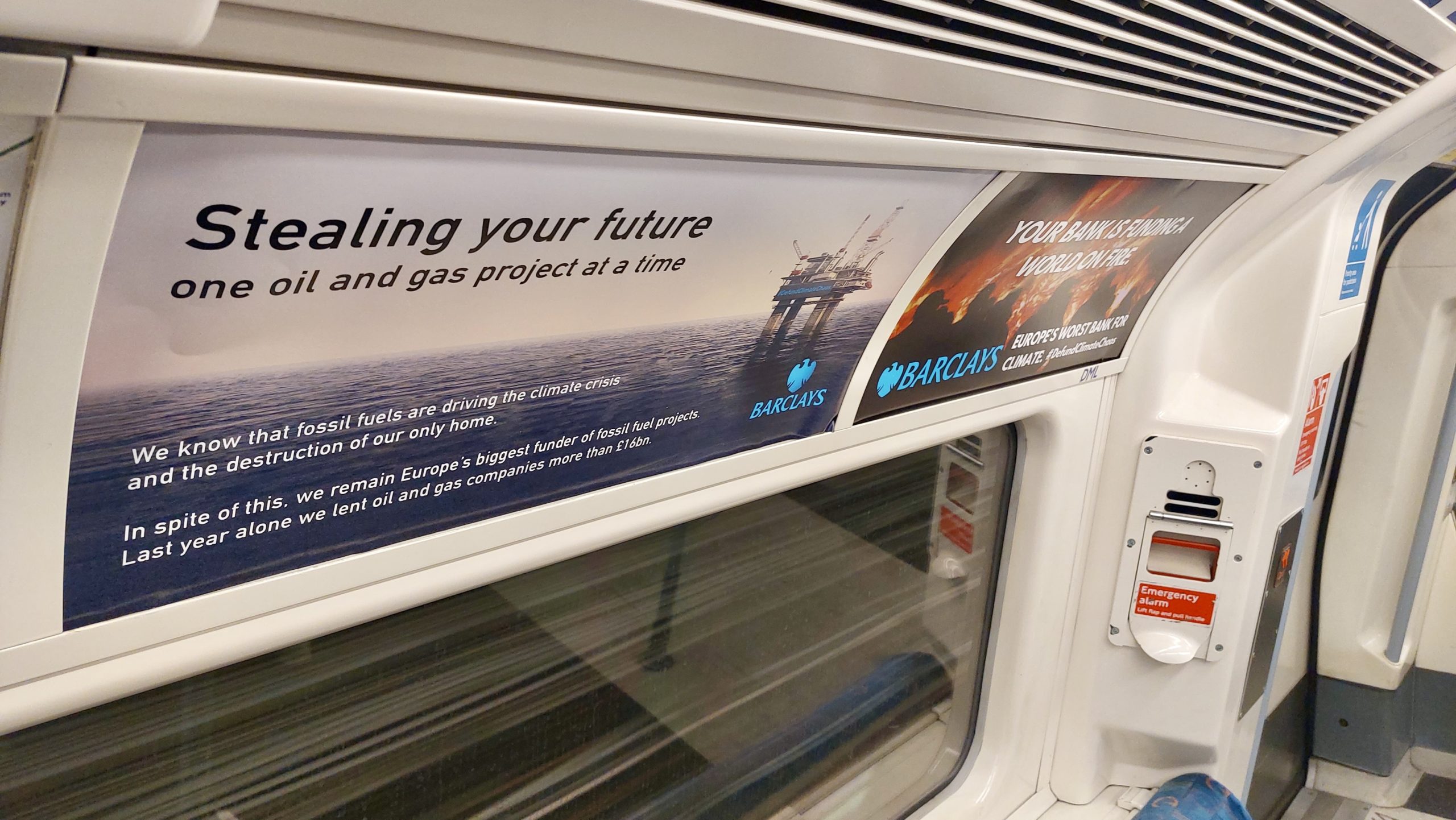 "Stealing your future one oil and gas project at a time" states the spoof advert plastered on the underground
