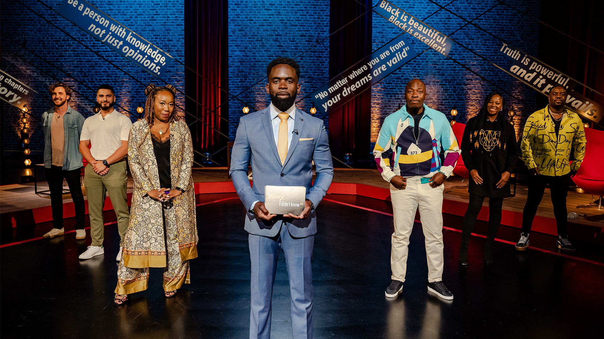 ITV panel show Sorry, I Didn't Know - featuring host Jimmy Akingbola and team captains Chizzy Akudolu and Eddie Kadi