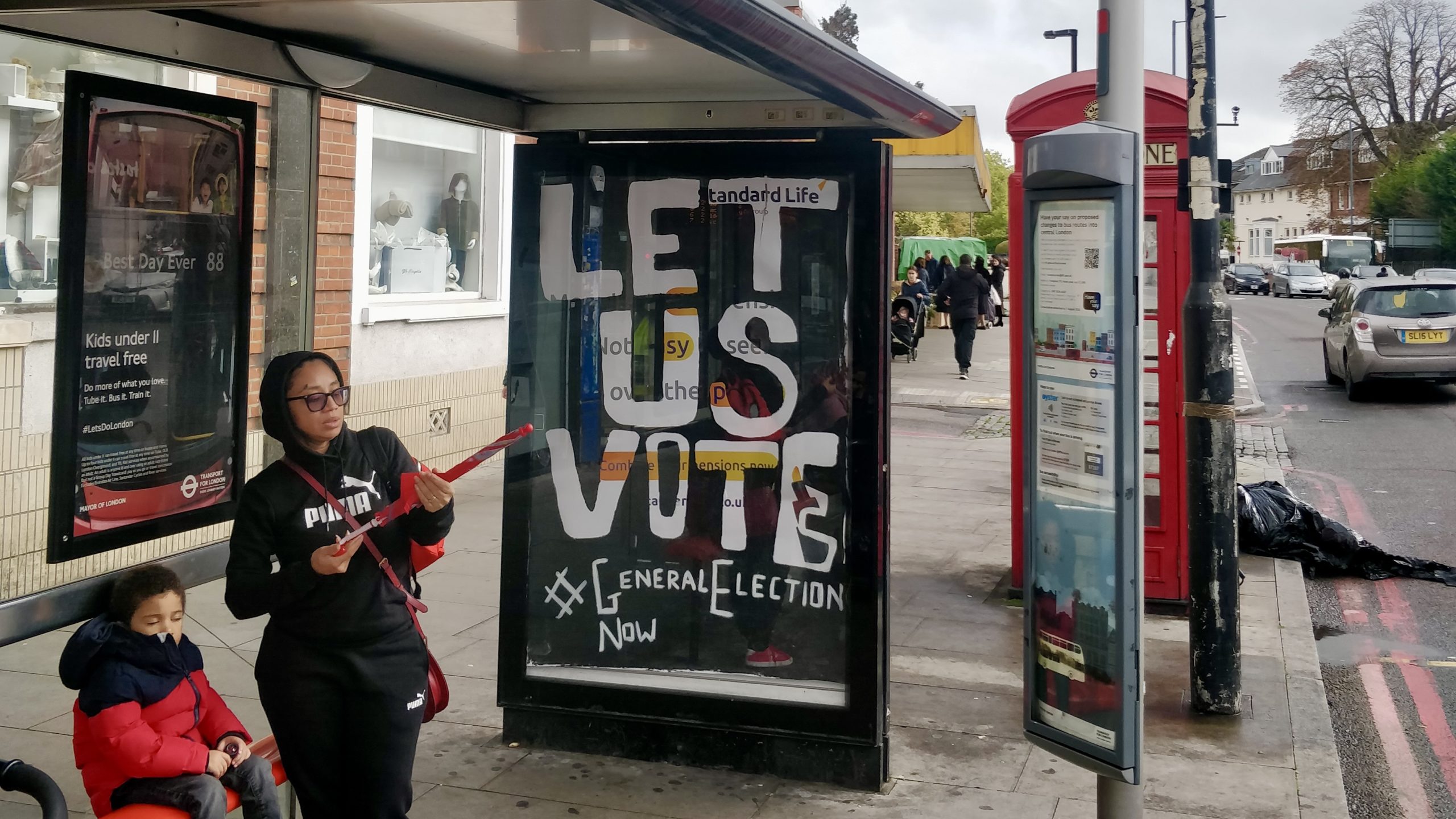 A fake poster reads: "Let us vote"