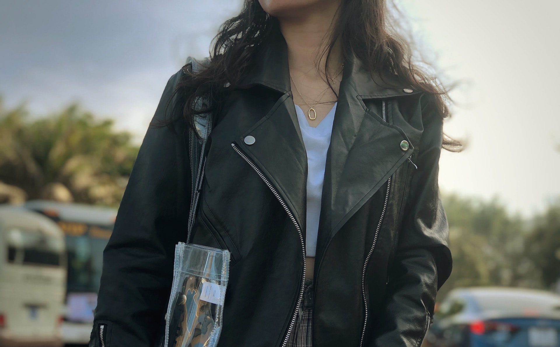 girl wearing leather jacket, which may not be sustainable