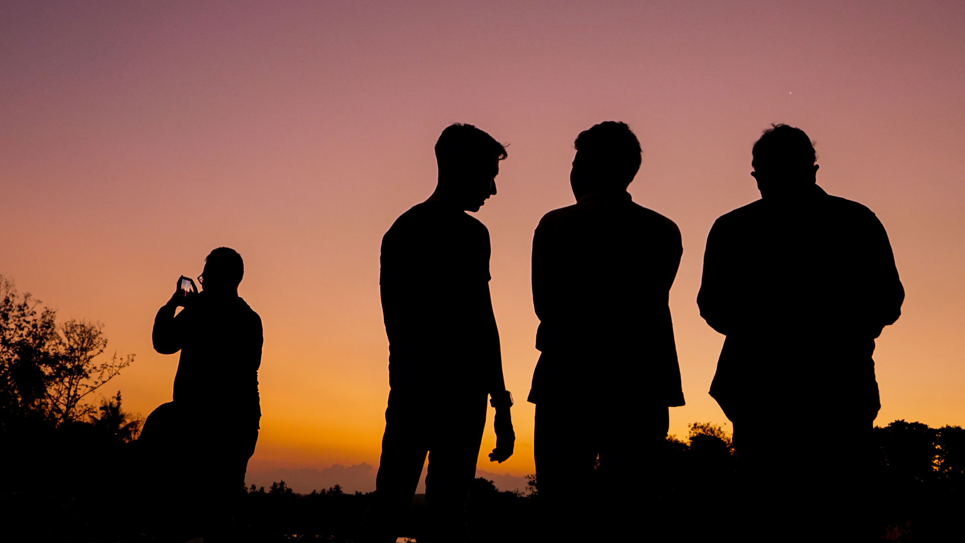 Mental health: four men in silhouette