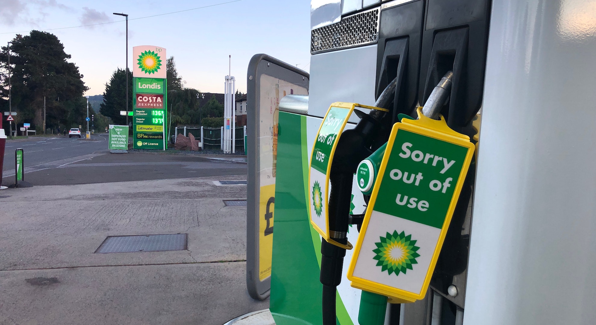 BP petrol station with 'out of use' signs on the pumps