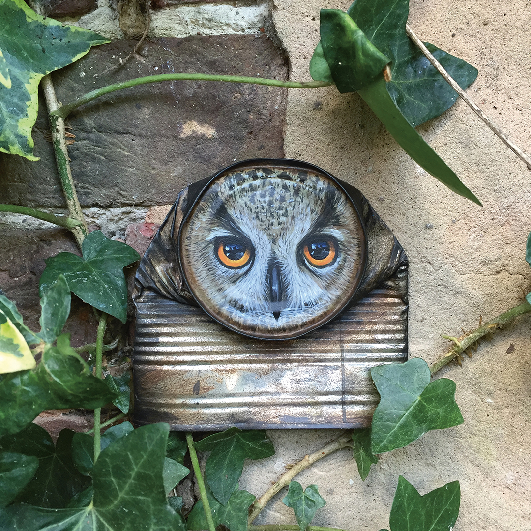 a crushed can with an owl painted on it by My Dog Sighs