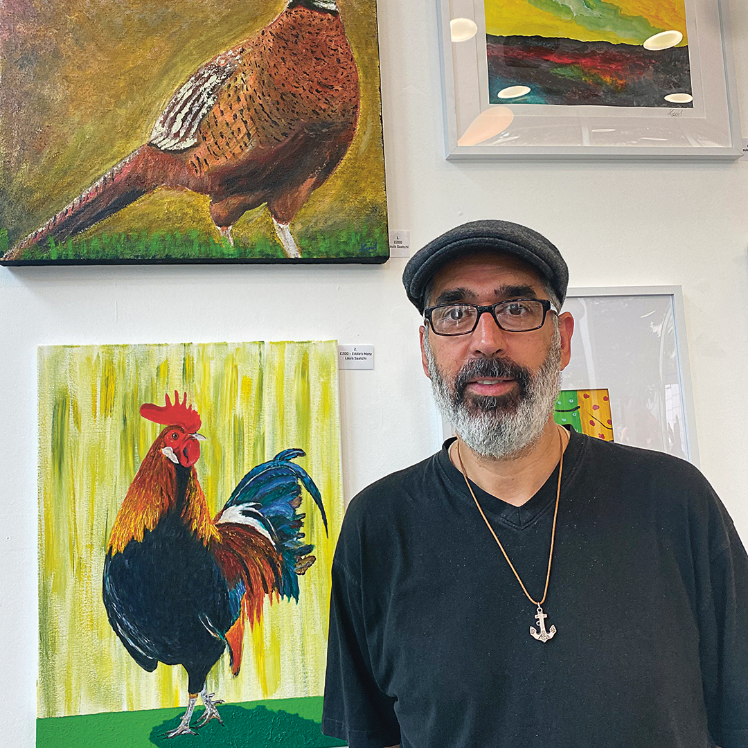 Lui Saatchi and his creation Eddie, a rooster