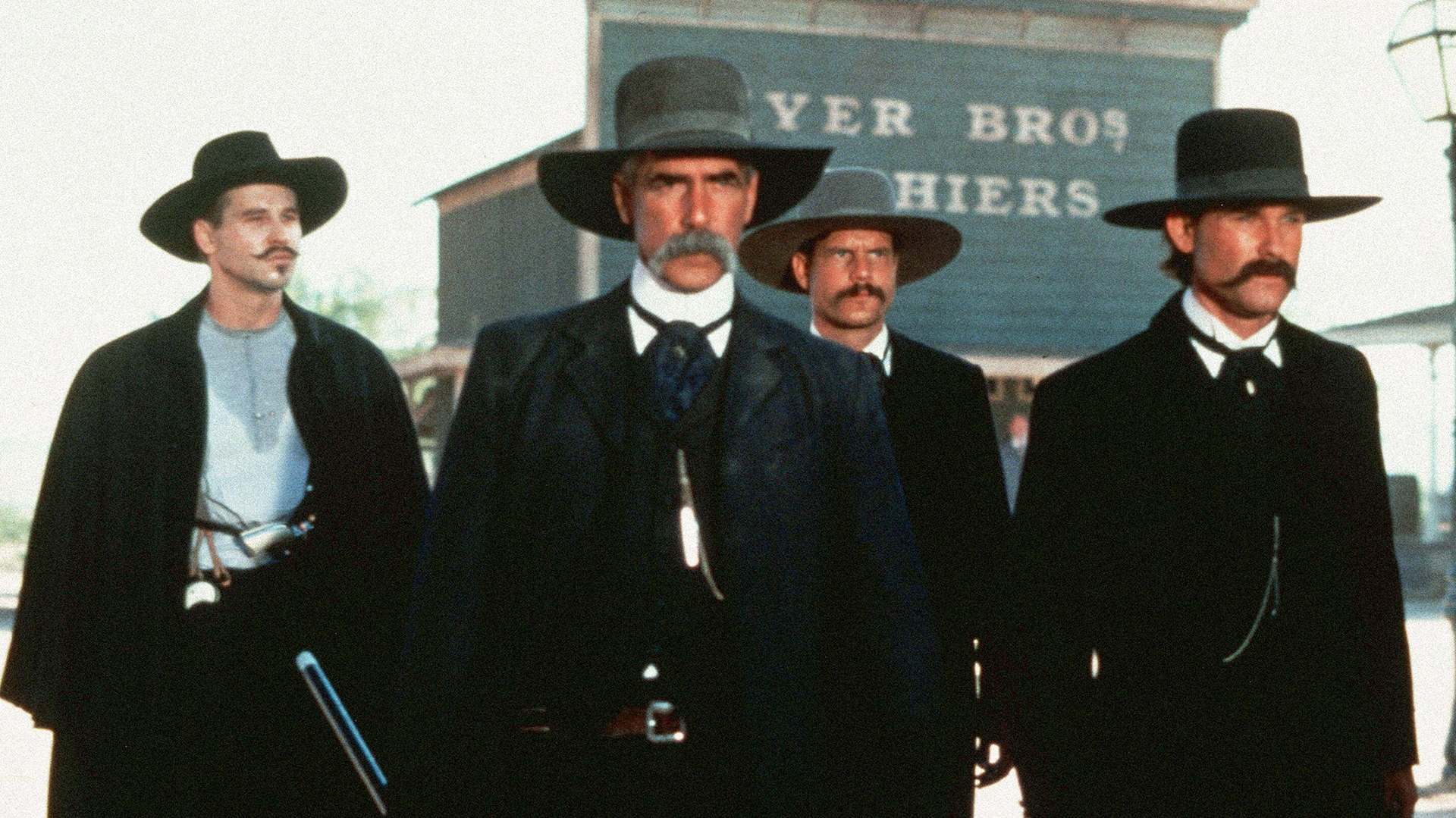 Four men in Wild West attire