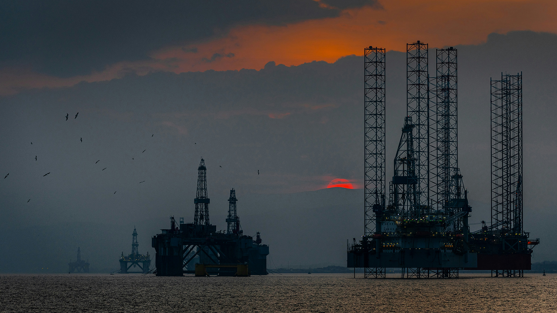 Oil rigs in the sunset
